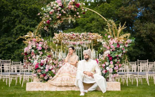 Asian Wedding Open Day Showcase featuring a married couple under a mandap