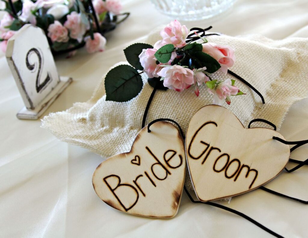 Weddings In Bracknell featuring a bride and groom floral table setting